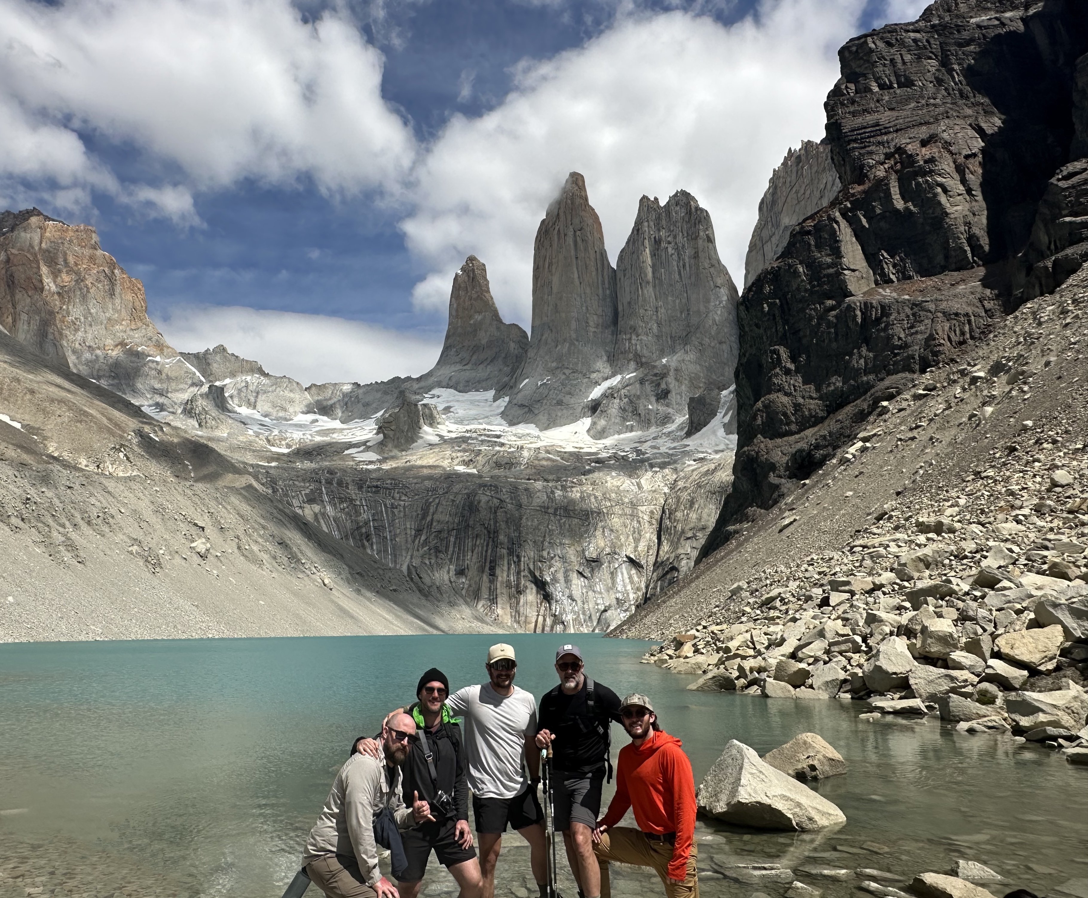 Group on mountaintop at sunrise
